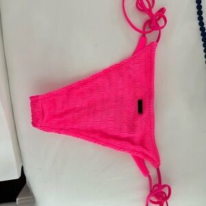 Triangle bikini bottoms and bag